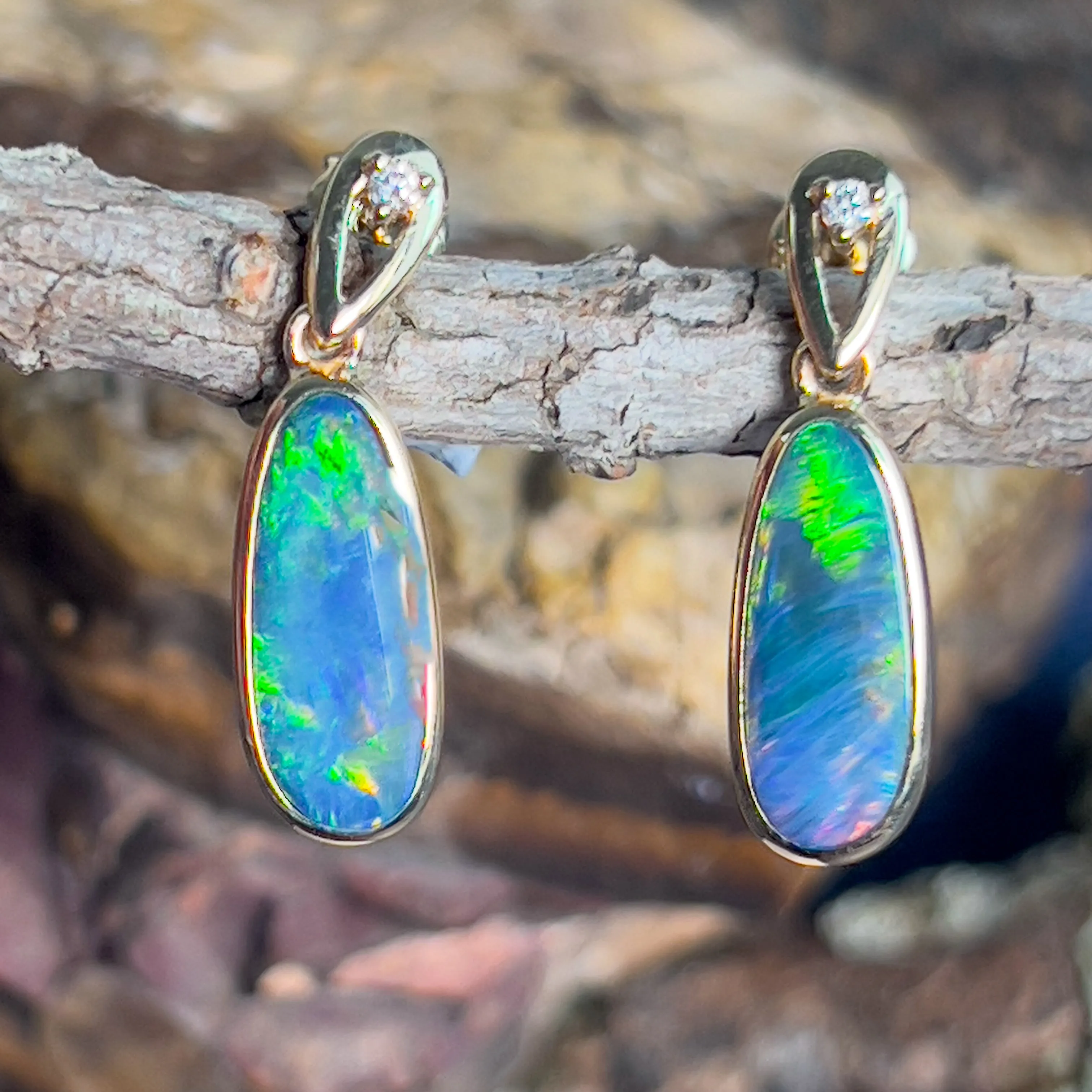 14kt Yellow Gold dangling earrings set with Opal doublets and diamonds