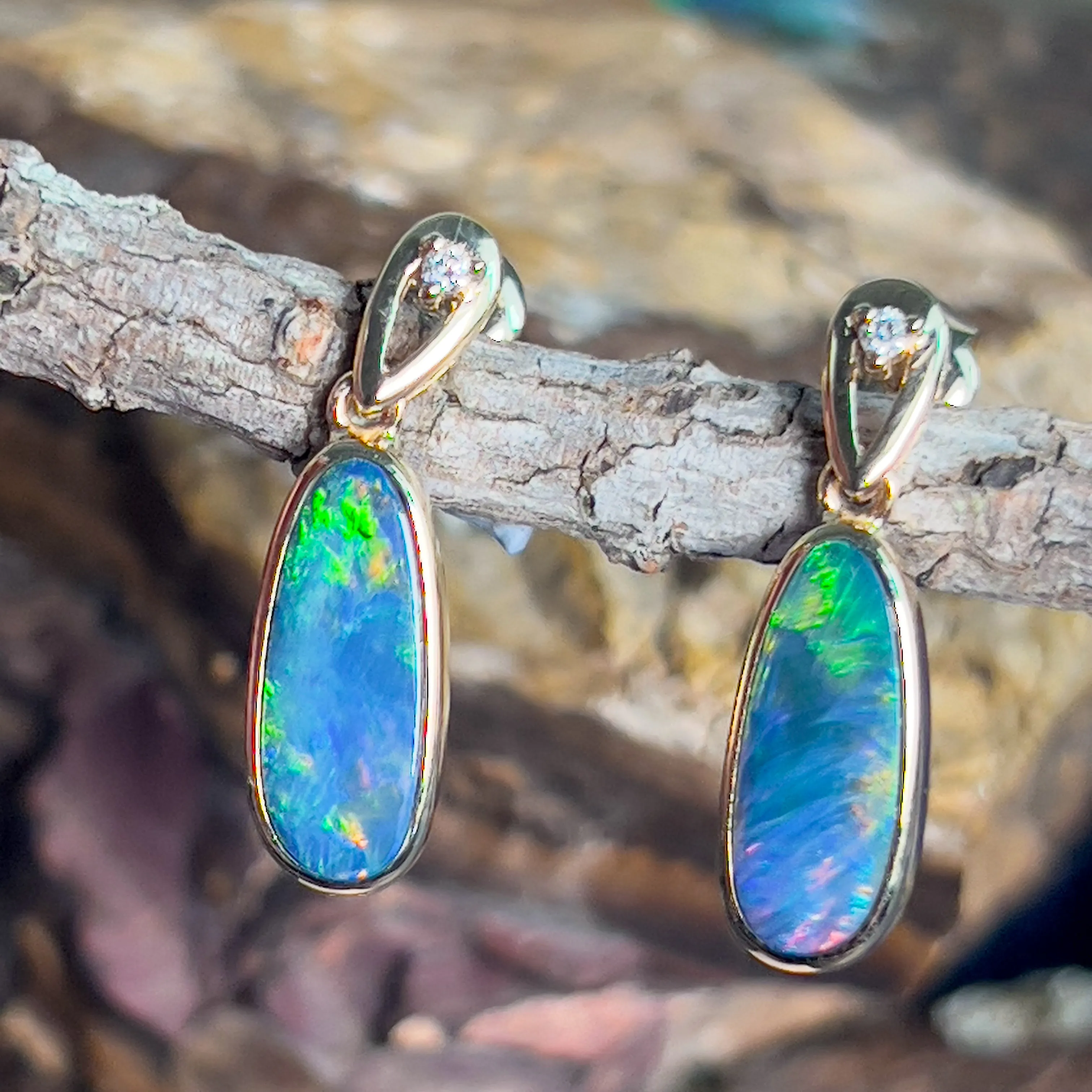 14kt Yellow Gold dangling earrings set with Opal doublets and diamonds