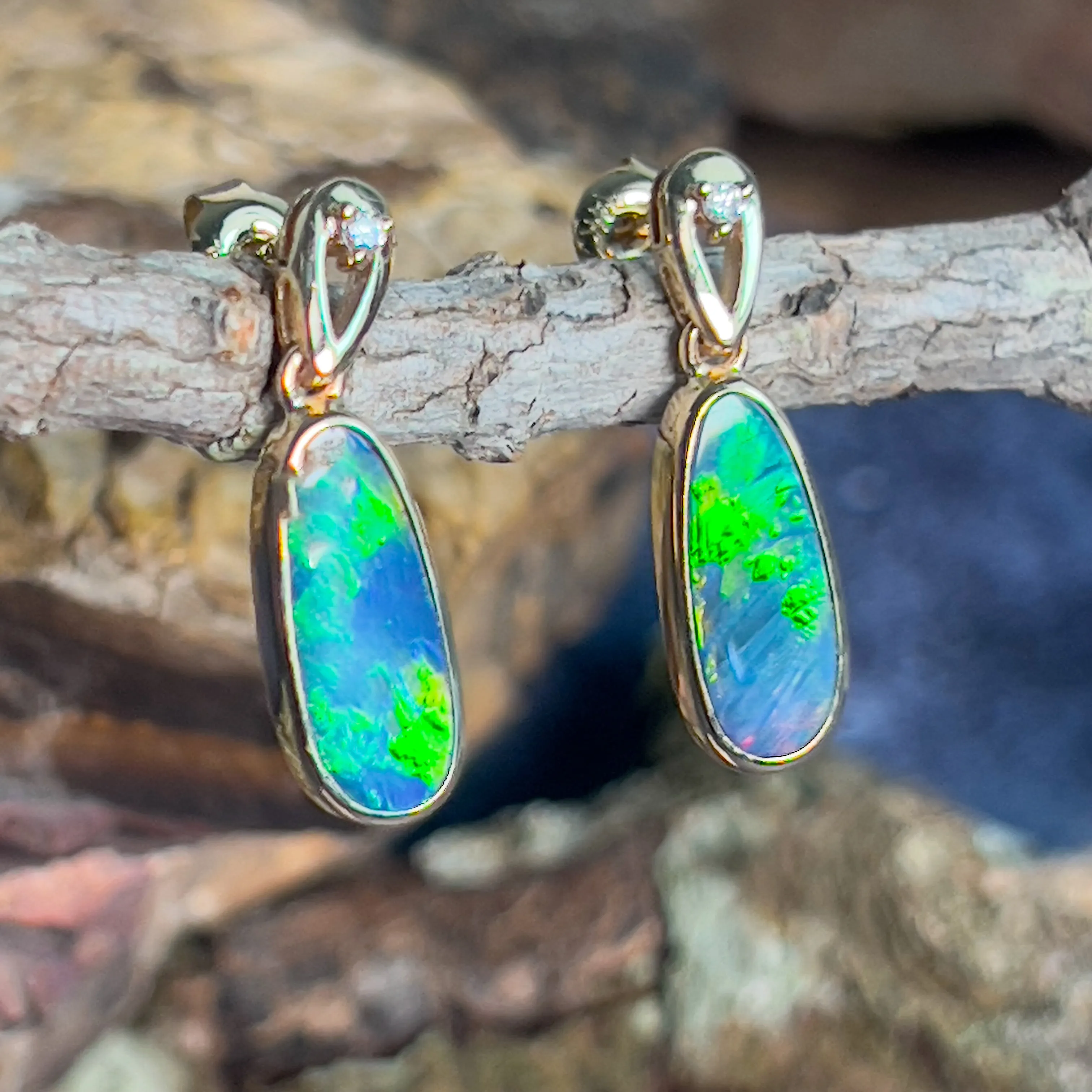 14kt Yellow Gold dangling earrings set with Opal doublets and diamonds