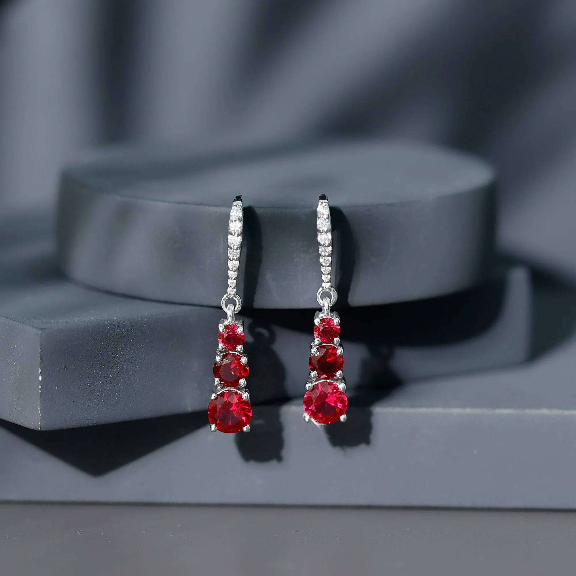 2.50 CT Lab Created Ruby Three Stone Dangle Earrings with Moissanite