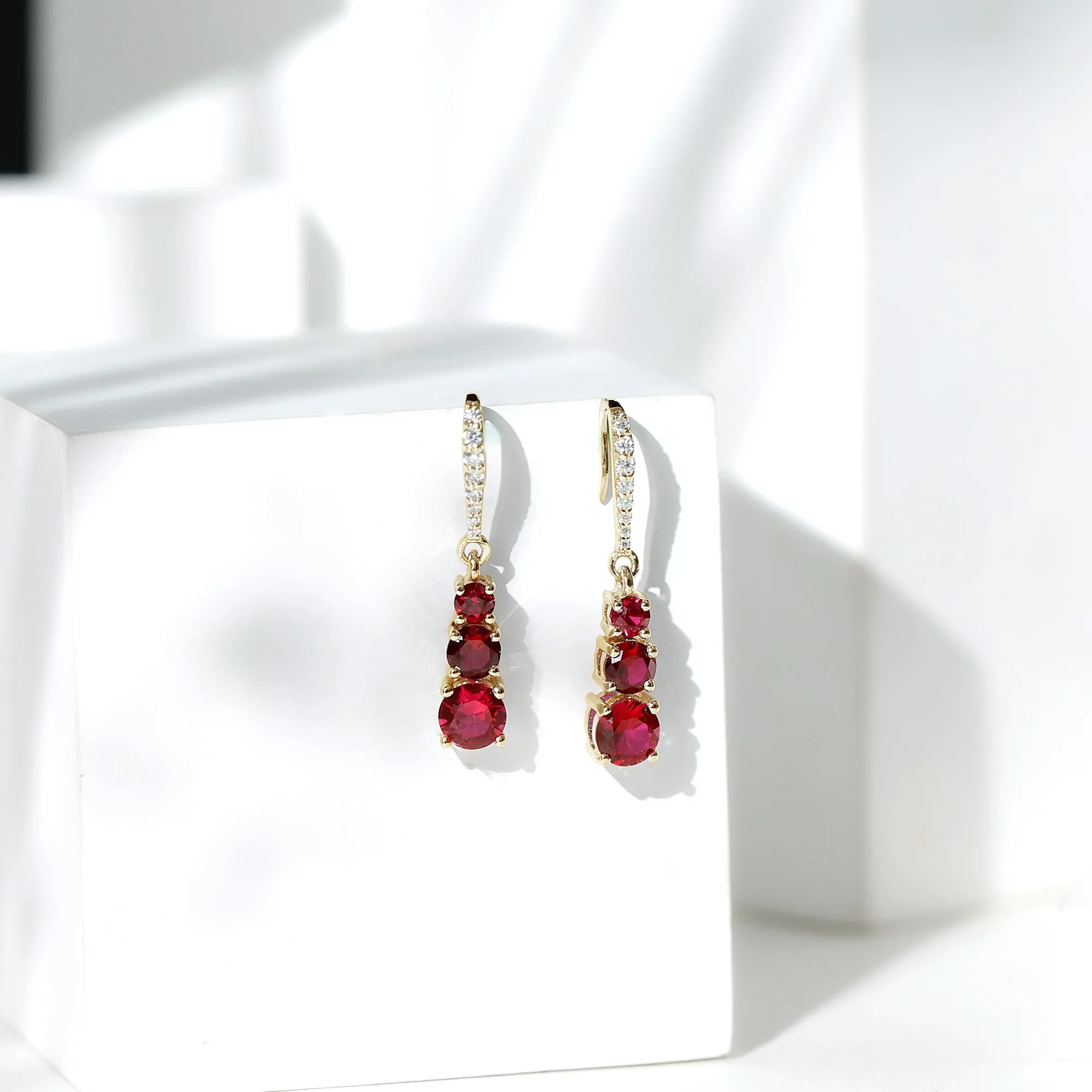 2.50 CT Lab Created Ruby Three Stone Dangle Earrings with Moissanite