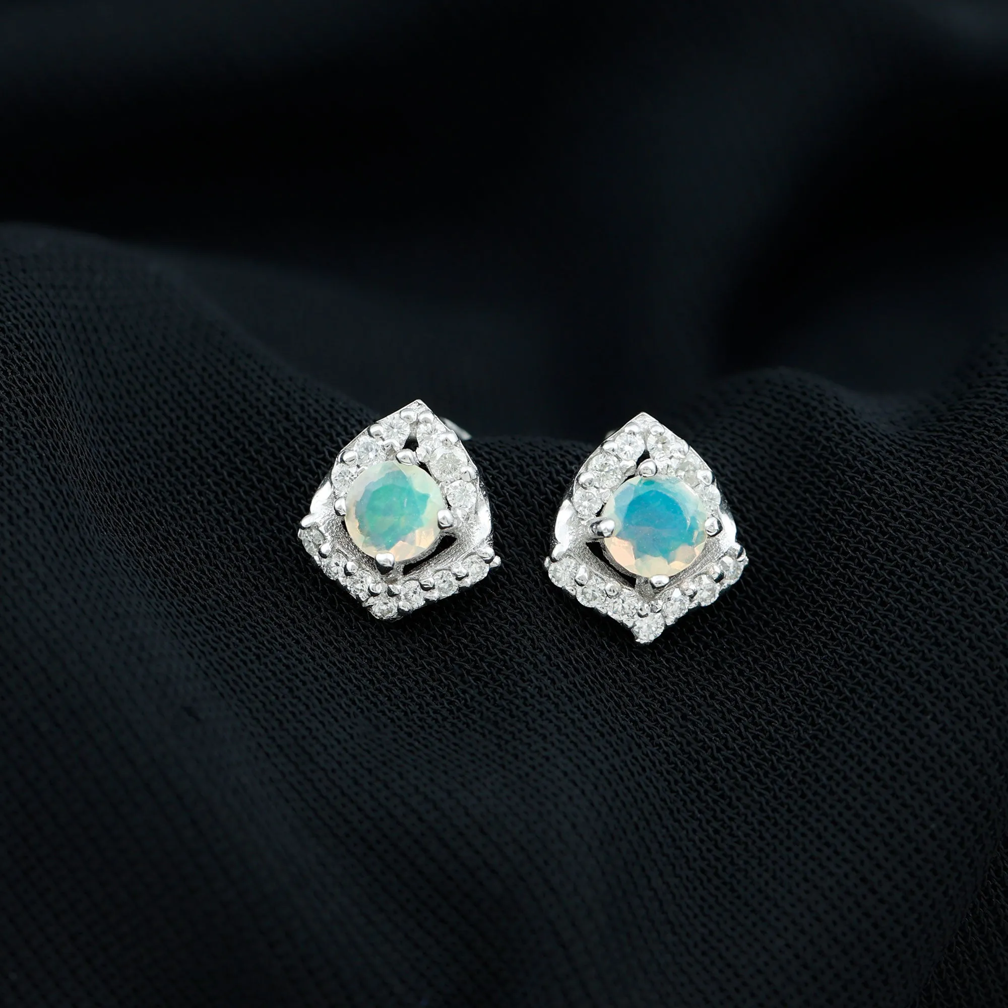 3/4 CT Ethiopian Opal Stud Earrings with Moissanite Accent