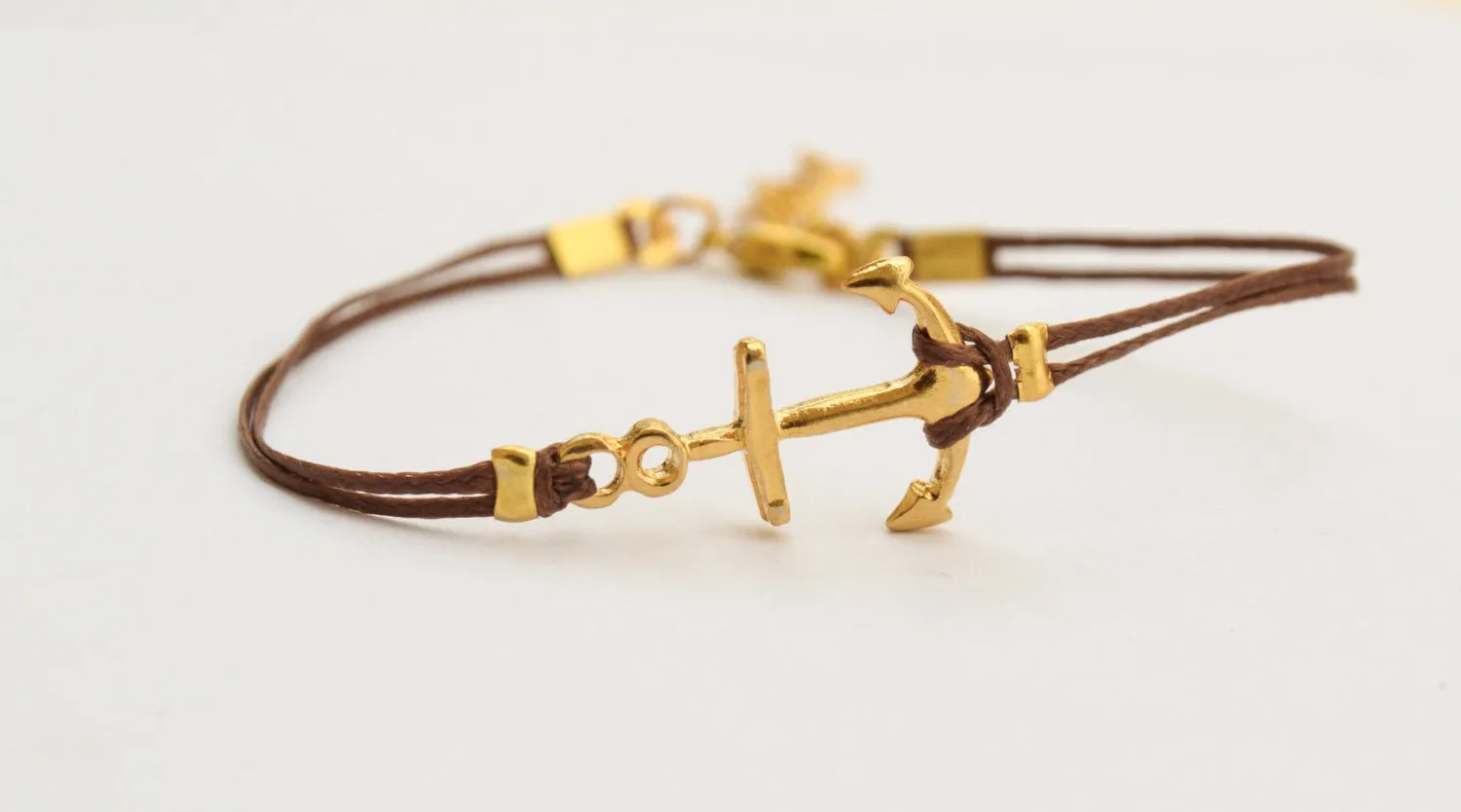 Brown bracelet with gold anchor charm