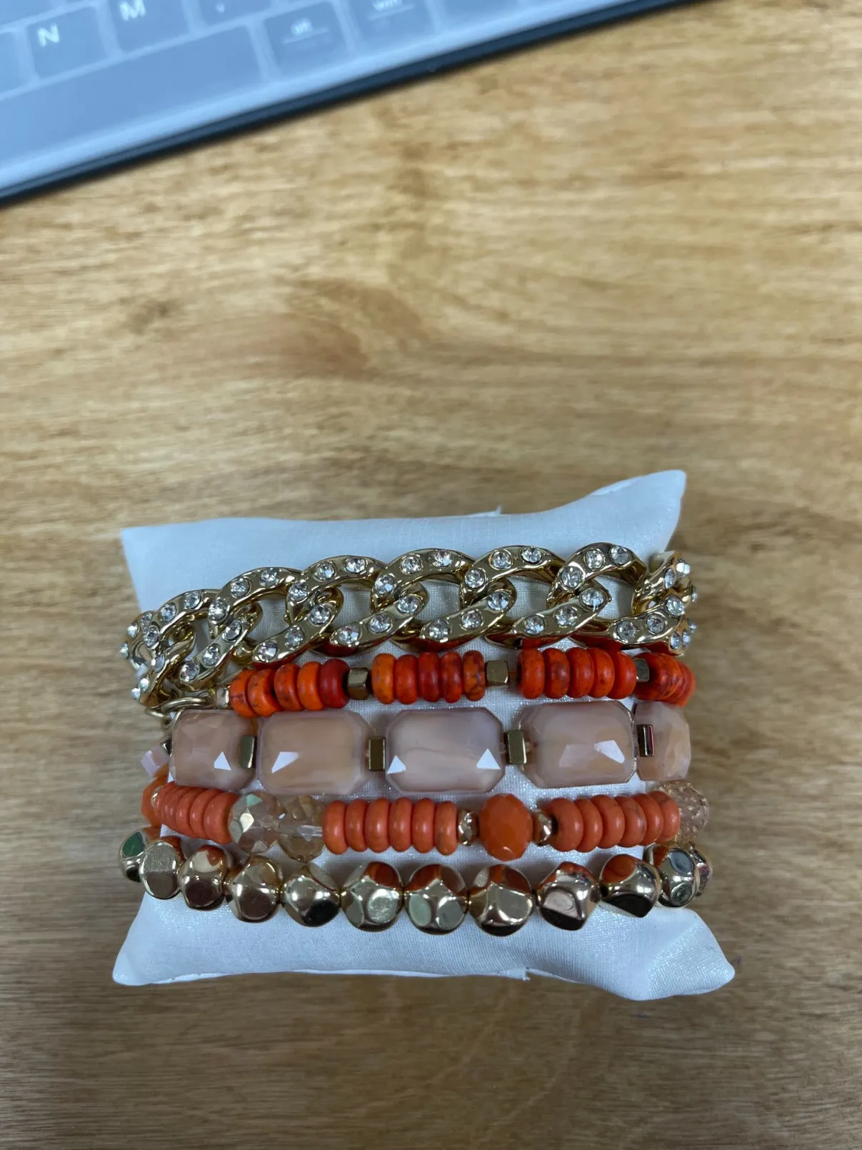Chained to Memories orange and gold five strand bracelet