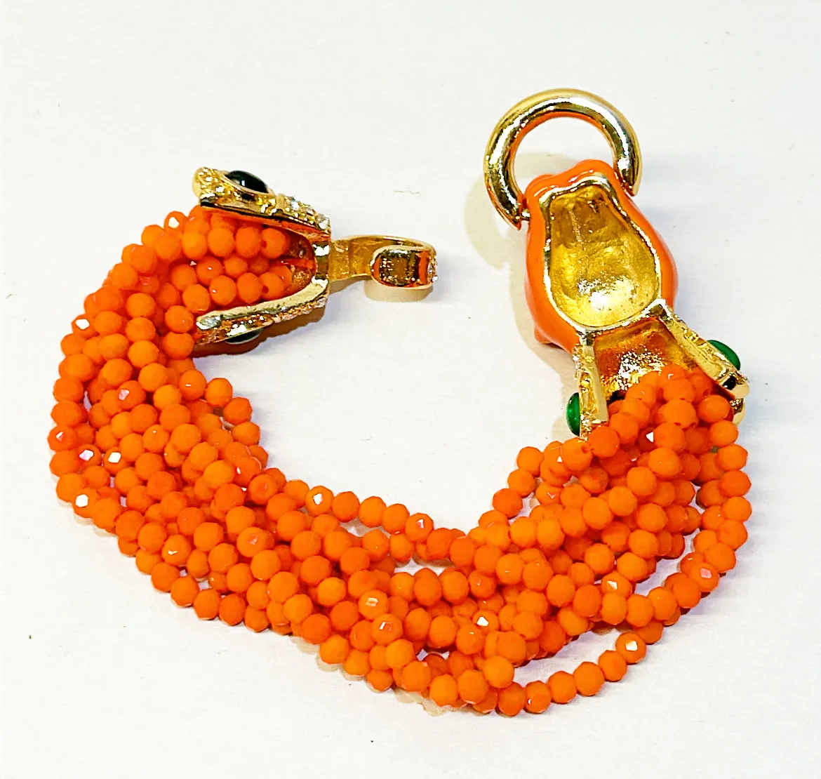 Fabulous coral multi strand statement bracelet with coral enamel leopard head