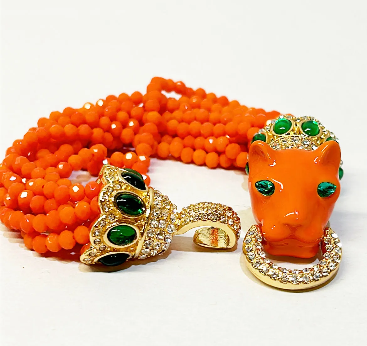 Fabulous coral multi strand statement bracelet with coral enamel leopard head