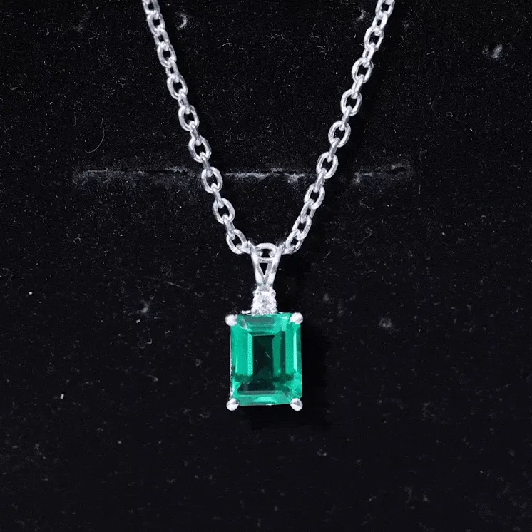 Octagon Cut Created Emerald Solitaire Pendant with Dainty Moissanite